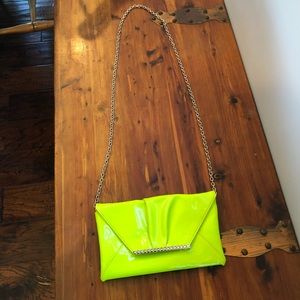 Neon green Aldo clutch with chain
